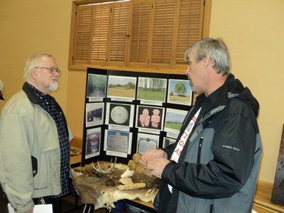 Dale Mitchell checks out the Native History Association table.