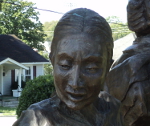 A detail of the statue showing the mother's face.