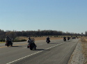 Riders continue on the Trail of Tears route down Highway 64..