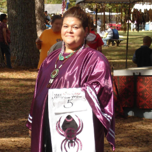 Yalonda Moore wears regalia featuring the water spider.